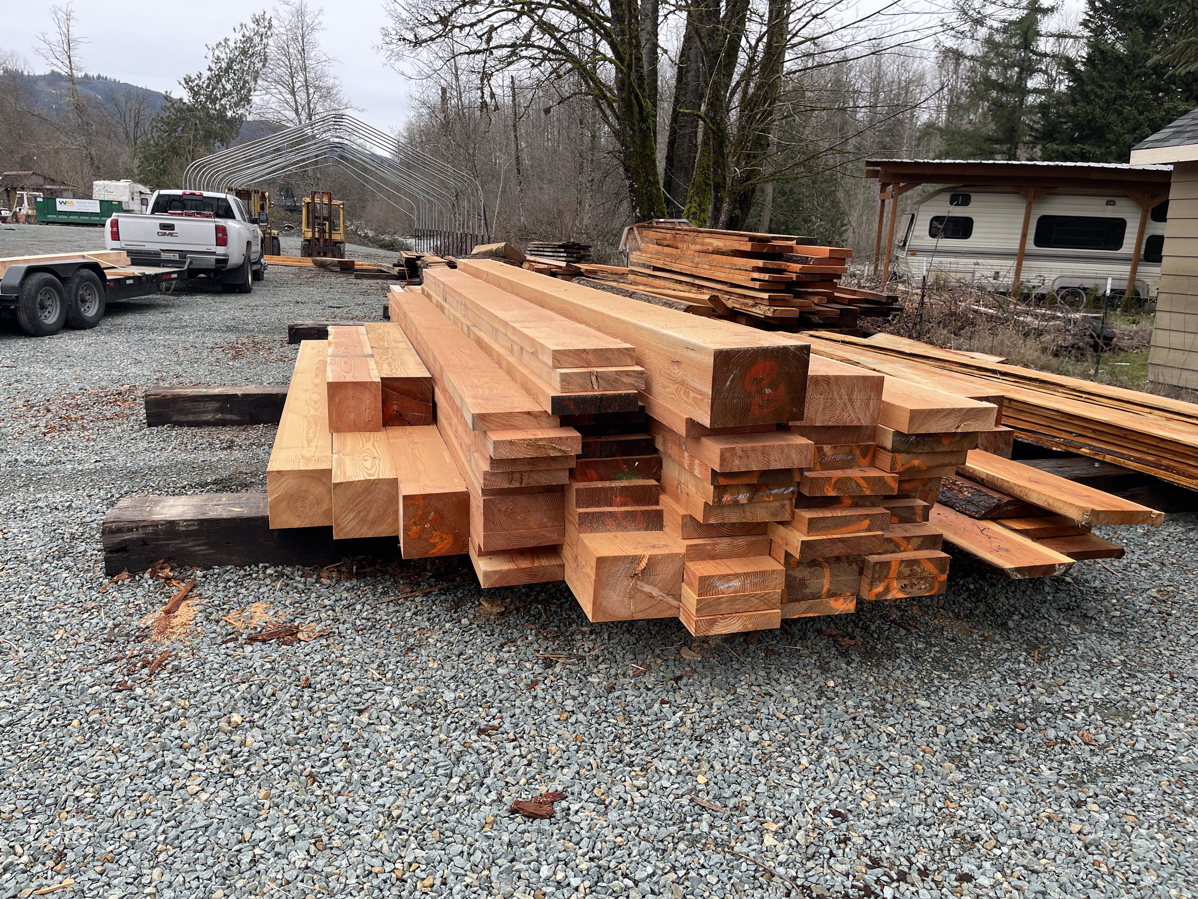 Douglas Fir timbers stacked at the Washington Timber Company mill yard in Arlington, WA