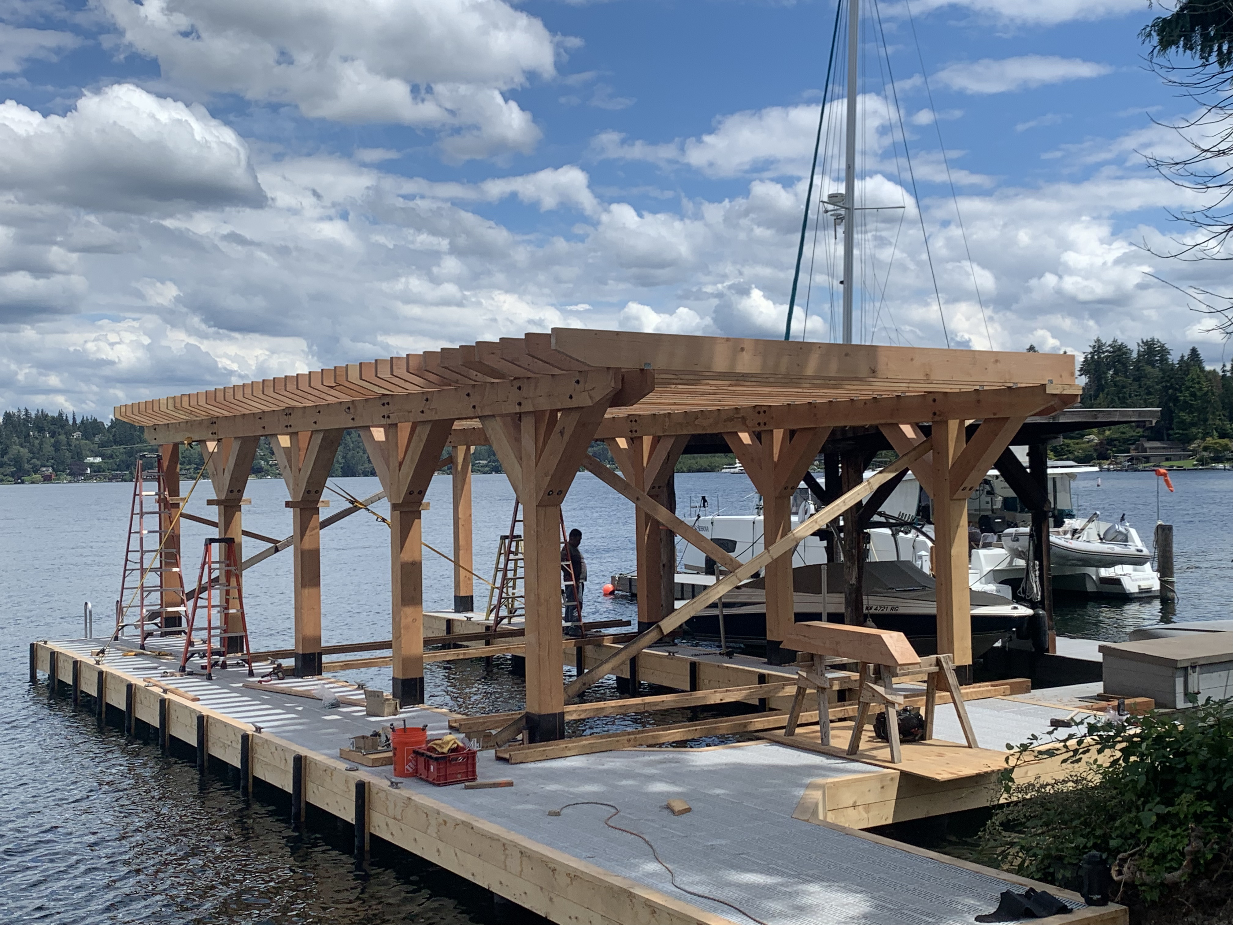 Timber boathouse construction on the water